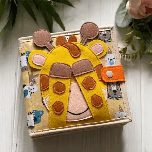 Front Cover of Giraffe Busy Book - eyes closed